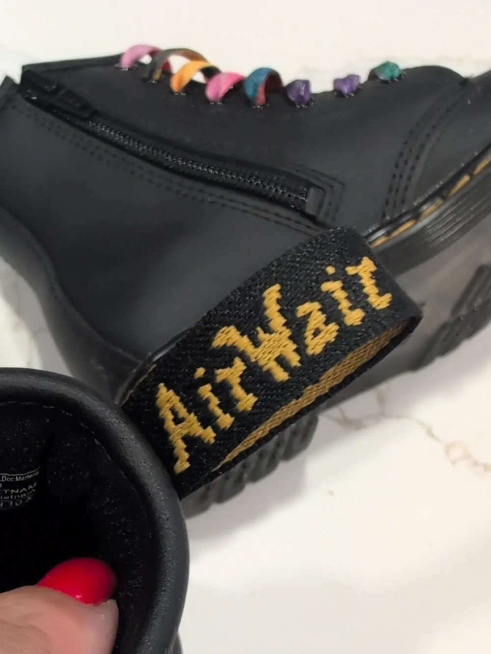 Dr. Martens Black Leather Boots with Multicolor Laces